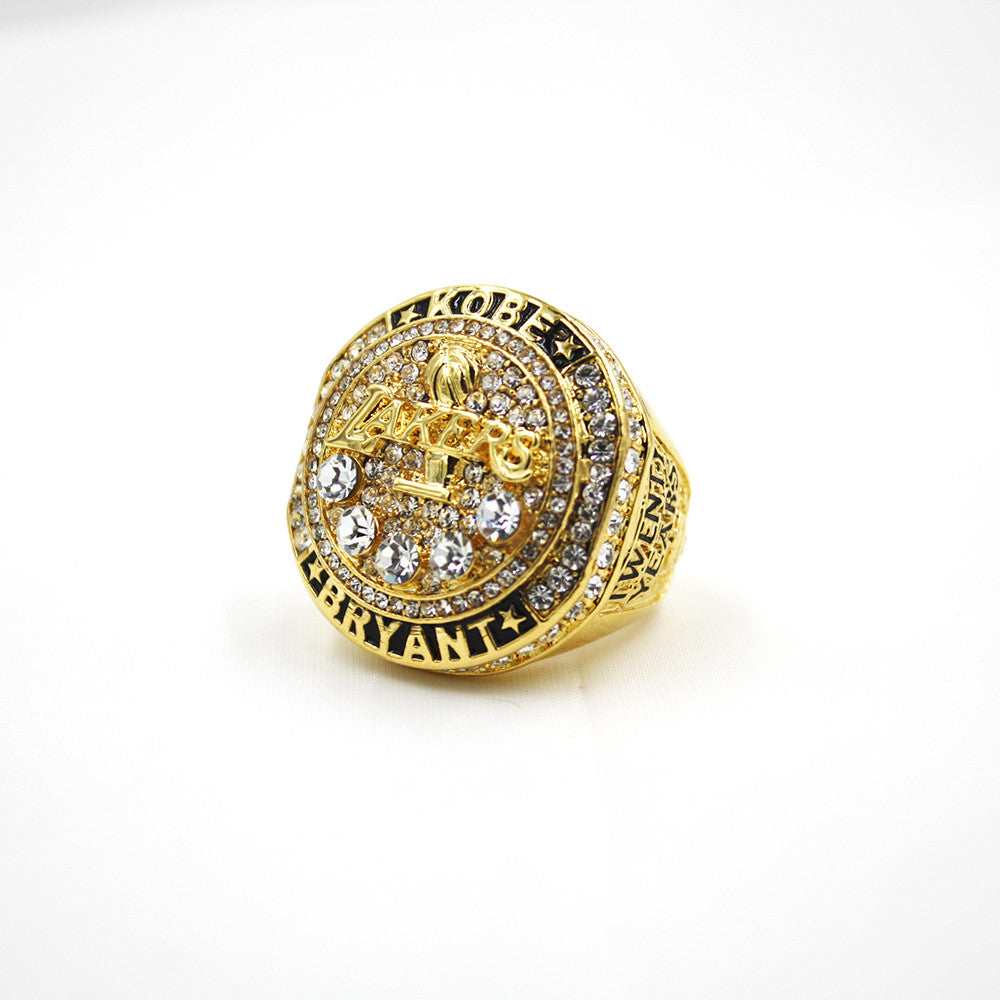 Kobe Bryant with Replica Lakers Championship Rings and